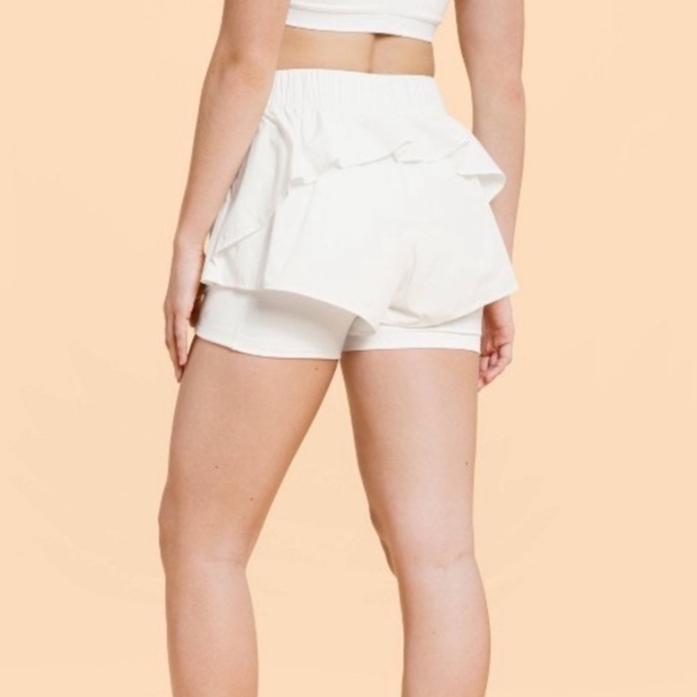 Blogilates cream ruffle athletic shorts